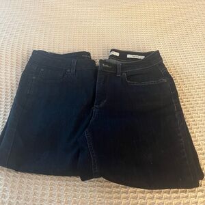 Two pair women’s jean capris.